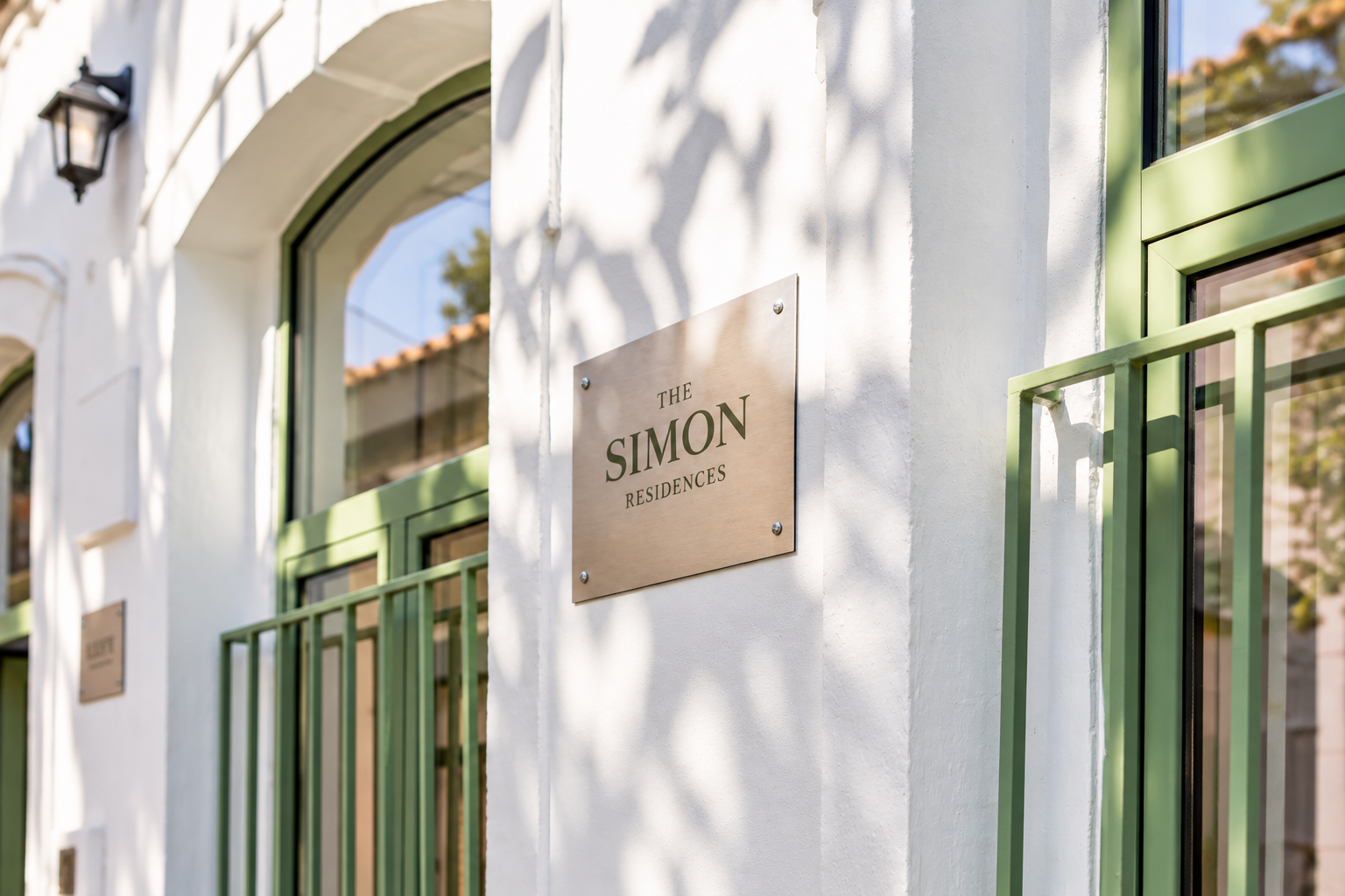 White Olhão residence with olive green doors
